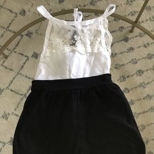 NWT black and white laced romper. 2-3 years.
